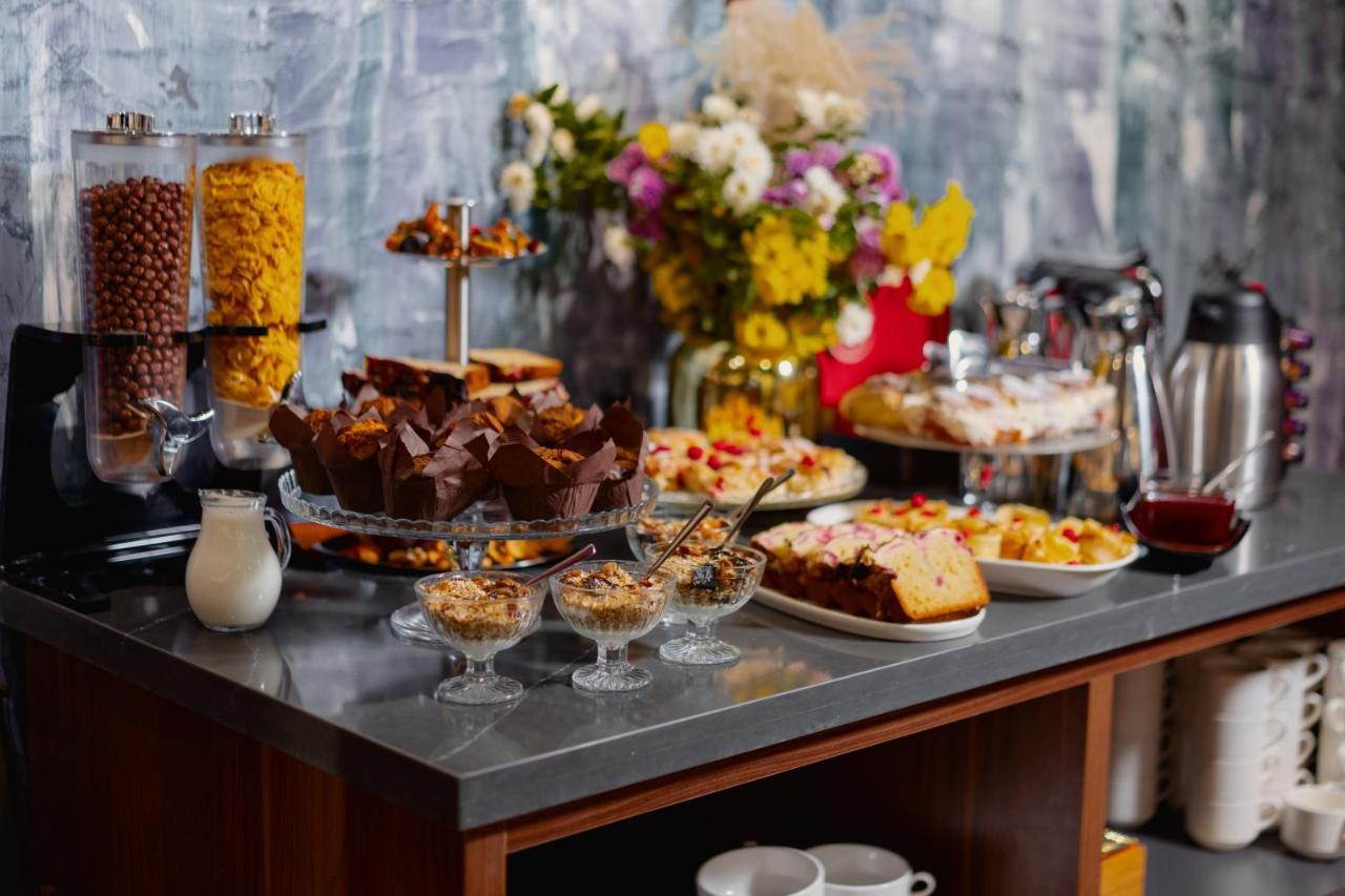 Tapis Rouge Design Boutique Hotel Батуми Екстериор снимка A buffet of desserts
